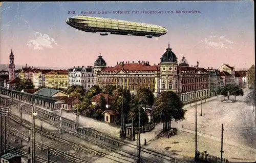 Ak Konstanz am Bodensee, Bahnhofplatz, Hauptpost, Marktstääte, Zeppelin, Bahnhof, Gleisseite