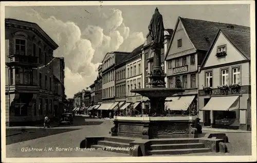 Ak Güstrow in Mecklenburg, Borwin Brunnen mit Pferdemarkt, Handlung