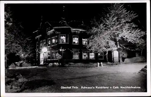 Ak Oberhof im Thüringer Wald, Hofmanns Konditorei, Nachtaufnahme, Winter