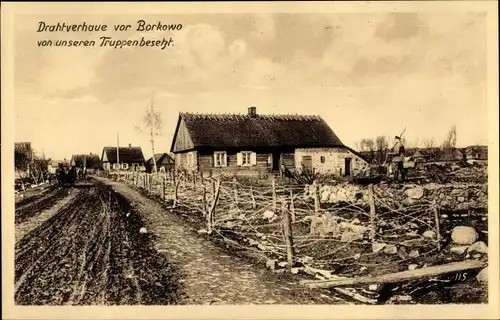 Ak Borkowo Ostpreußen, Drahtverhaue, Straßenpartie, WK I