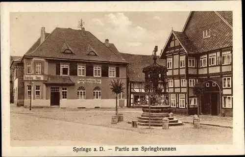 Ak Springe am Deister, Partie am Springbrunnen, Gasthof Deutsches Haus