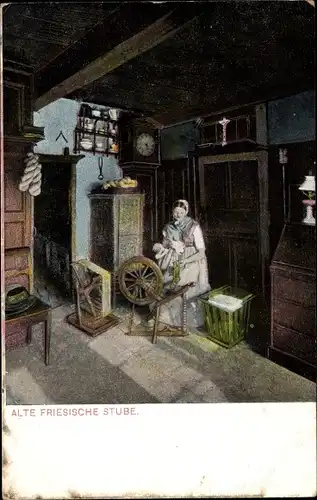 Ak Alte friesische Stube, Dame in Tracht, Spinnrad