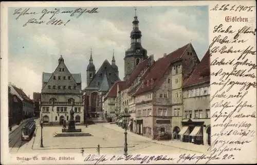 Ak Lutherstadt Eisleben, Marktplatz, Rathaus, Straßenbahn, Geschäfte, Denkmal