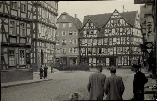 Foto Ak Melsungen in Hessen, Rathaus, Straßenpartie, Fachwerkhäuser