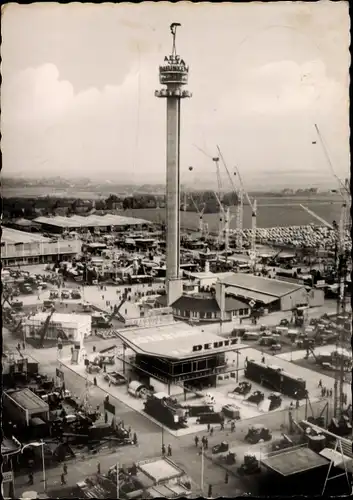 Ak Hannover, Messegelände mit Hermes Turm gesehen, errichtet 1956