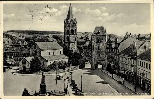 Ak Lutherstadt Eisenach in Thüringen, Karlsplatz mit Lutherdenkmal und Nikolaitor