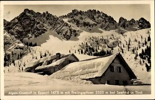 Ak Eppzirl Tirol, Alpengasthof mit Freiingspitzen, Winteransicht