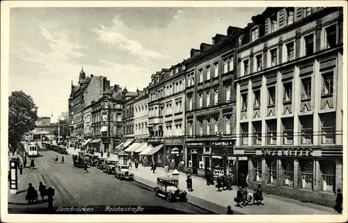 Ak Saarbrücken im Saarland, Reichsstraße, Geschäfte, Autos