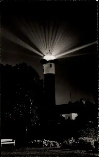 Ak Nordseebad Wangerooge in Ostfriesland, Leuchtturm bei Nacht