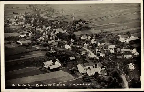 Ak Reichenbach Großvoigtsberg Großschirma im Kreis Mittelsachsen, Fliegeraufnahme vom Ort