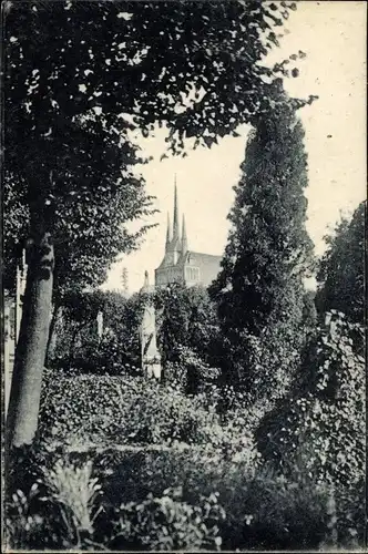 Ak Lommatzsch in Sachsen, Motiv vom Friedhof mit Kirche