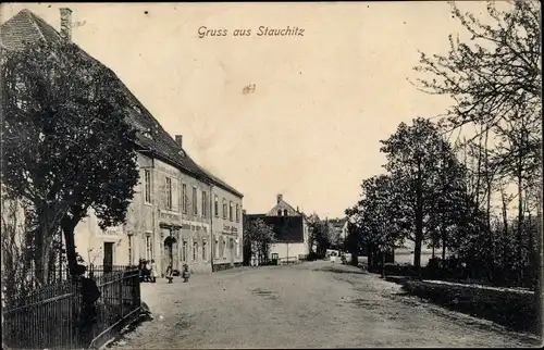 Ak Stauchitz in Sachsen, Straßenpartie, Gasthaus, Geschäftshäuser