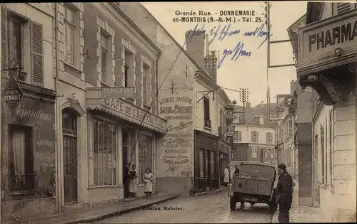 Ak Donnemarie en Montois Seine et Marne, Grande Rue, Cafe, Pharmacie