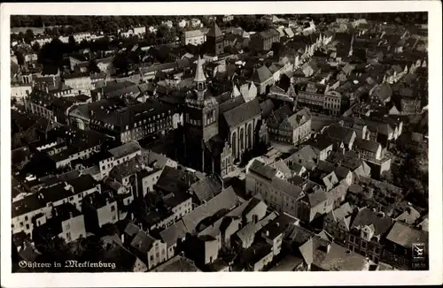 Ak Güstrow im Kreis Rostock, Fliegeraufnahme der Stadt, Kirche, Klinke & Co. 18638