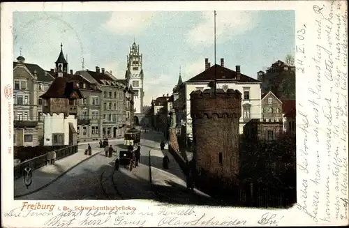 Ak Freiburg im Breisgau, Schwabentorbrücke, Tram, Turm, Kutsche