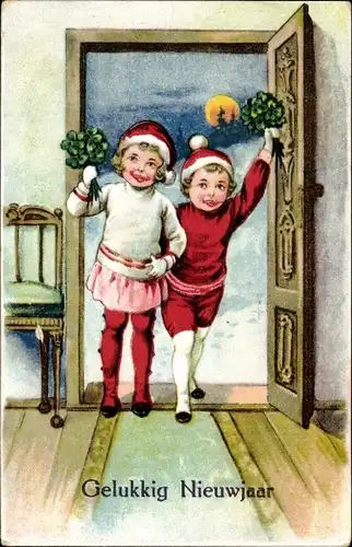 Ak Glückwunsch Neujahr, Junge und Mädchen mit Klee in der Haustür