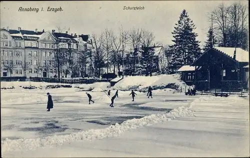 Ak Annaberg Buchholz im Erzgebirge, Eisläufer auf dem Schutzteich