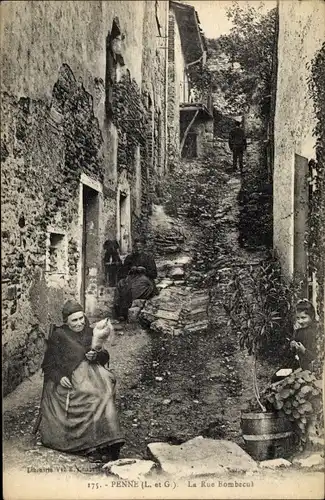 Ak Penne Lot et Garonne, La Rue Bombecul, Frau mit Spindel