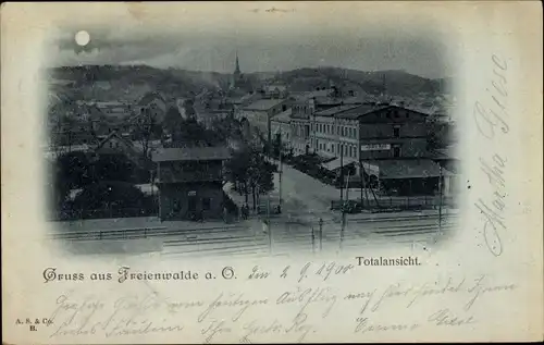 Mondschein Ak Bad Freienwalde an der Oder, Totalansicht, Bahnübergang
