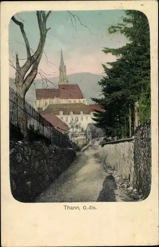 Ak Thann Elsass Haut Rhin, Ortspartie, Blick auf die Kirche