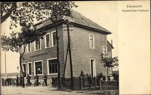 Ak Edewecht Ammerland, Straßenpartie mit Blick auf Kaiserliches Postamt, Postboten