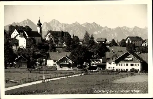 Ak Wildsteig, Kirche vor Tannheimer Gebirge, 1955