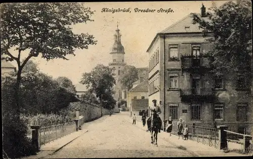 Ak Königsbrück in der Oberlausitz, Blick in die Dresdner Straße mit Kirche