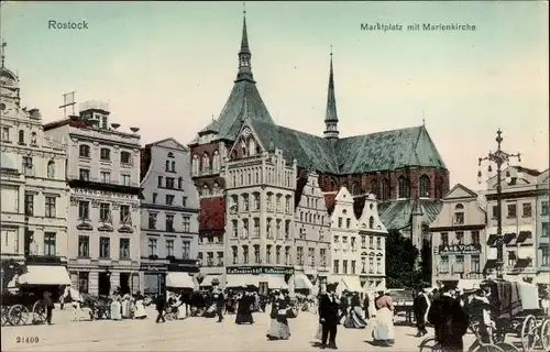 Ak Rostock in Mecklenburg Vorpommern, Marktplatz mit Marienkirche, Ratsapotheke, Speditionsgeschäft