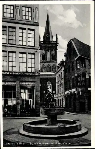 Ak Krefeld am Niederrhein, Schwanenmarkt mit alter Kirche, Brunnen
