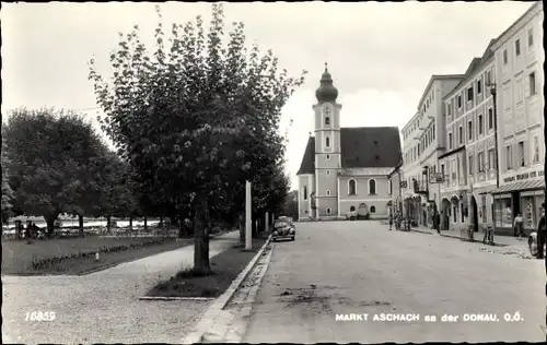 Ak Aschach an der Donau Oberösterreich, Straßenpartie, Kirche