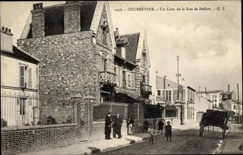 Ak Courbevoie Hauts de Seine, Un Coin de la Rue de Belfort