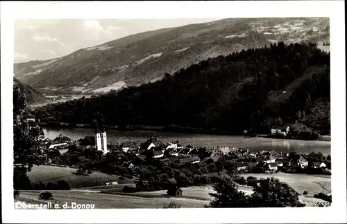 Ak Obernzell an der Donau Niederbayern, Ortschaft mit Landschaftsblick, Fähre