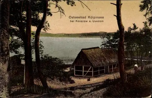 Ak Ostseebad Kölpinsee auf Usedom, Reetdachhaus mit Blick aufs Wasser