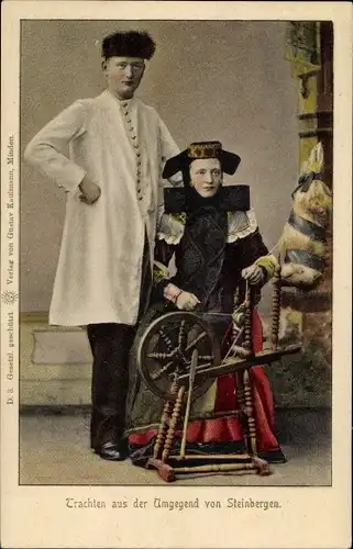 Ak Mann und Frau in Bückeburger Volkstrachten, Spinnrad
