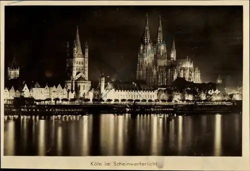 Ak Köln am Rhein, Stadt im Scheinwerferlicht, Dom