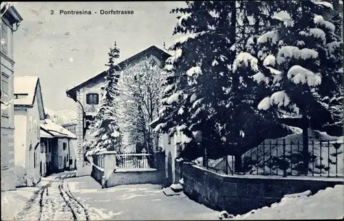 Ak Pontresina Kanton Graubünden Schweiz, Dorfstraße im Winter