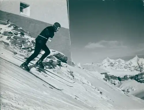 Foto Wintersport, Skifahrer bei der Abfahrt