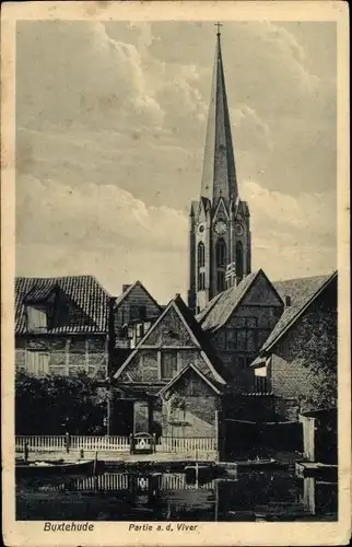 Ak Buxtehude im Kreis Stade, Partie an der Viver, Blick zur Kirche