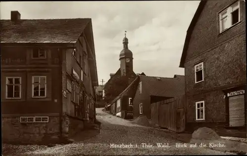 Ak Manebach Ilmenau in Thüringen, Blick auf die Kirche, Fleischerei