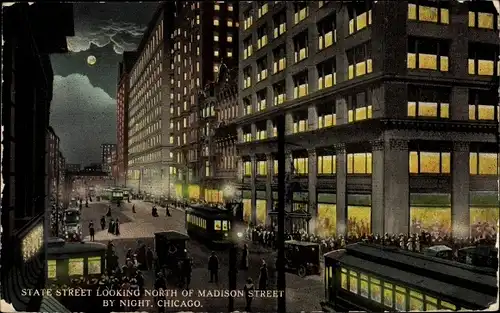 Ak Chicago Illinois, State Street looking north of Madison Street by Night, Straßenbahn