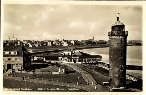 Ak Cuxhaven in Niedersachsen, Blick Leuchtturm und Seedeich