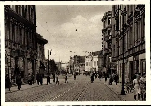 Ak Poznań Posen, Blick in die Wilhelmstraße, Geschäfte