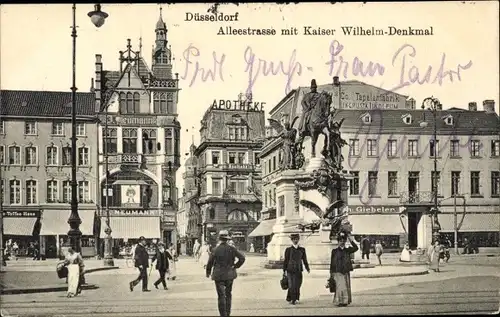 Ak Düsseldorf am Rhein, Alleestraße mit Kaiser Wilhelm-Denkmal, Apotheke, Geschäfte