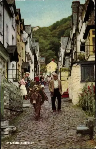 Ak Clovelly Devon England, Up a long, Straßenpartie, Häuser