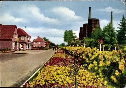 Ak Wiesmoor in Ostfriesland, Blumenschmuck beim Torhaus