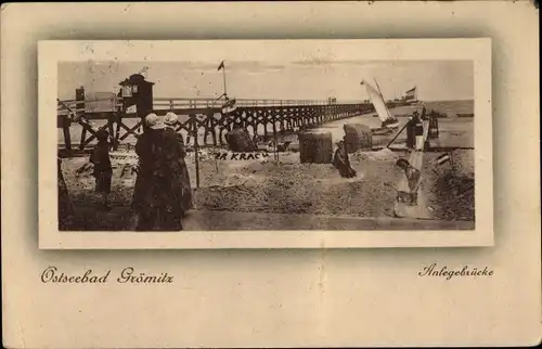 Ak Ostseebad Grömitz in Holstein, Anlegebrücke, Strand