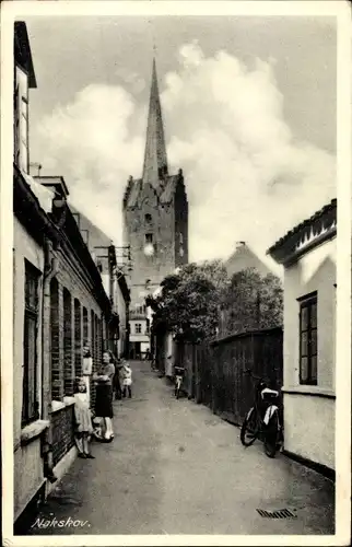 Ak Nakskov Dänemark, Straßenpartie, Kirche