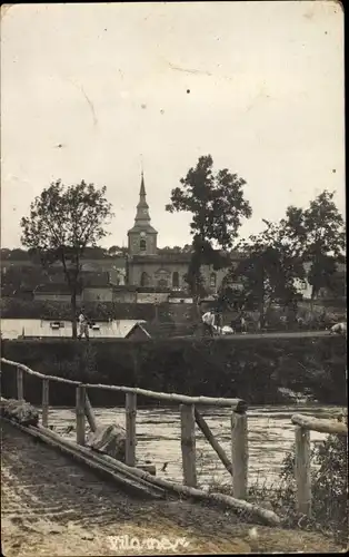 Foto Ak Schweiz?, Ortspartie, Brücke, Fluss, Kirche