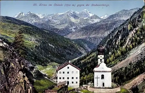 Ak Heiligkreuz Sölden in Tirol, Ortspartie im Ötztal gegen die Stubaierberge