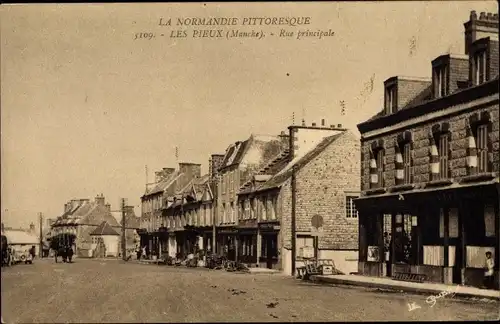 Ak Les Pieux Manche, Rue Principale